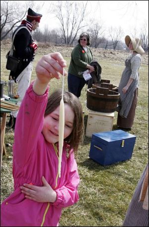 nbrw history10 4/5/2008 blade photo by herral long   Sabrina Catelyn 6 of Morenci michigan shows candle she dipped herself   _____________ Hands on History Saturday at Fort Meigs ? April 5, 2008 After a long winter, Fort Meigs? gates are re-opened. Help us kick-off the 2008 season with a ?bang? as we present A Soldier?s Life, a Hands-on History Saturday program on Saturday, April 5. Witness musket demonstrations and learn about the life of a soldier or camp follower during the War of 1812 by experiencing the activities that soldiers performed on a daily basis like laundry, drilling with the musket, and marching. The program runs from 1:00 - 4:00 p.m. and all activities are included with paid admission. Fort Meigs is open Wednesday through Saturday from 9:30 am to 5:00 pm and Sundays Noon to 5:00 pm. Admission is $7- Adults; $6- Seniors, $3- Students; Free- Five and under. Fort Meigs, one of 60 Ohio Historical Society sites, is located one mile west of Perrysburg, Ohio on State Route 65. For further information call the fort at 800-283-8916 or visit us on-line at www.fortmeigs.org