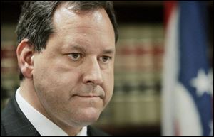 'There is nothing I have done to make me resign,' a defiant Marc Dann told his spokesman, James Gravelle. Mr. Dann admitted Friday to an extramarital affair with an employee shortly after taking office last year. (COLUMBUS DISPATCH)
<br>
 <img src=http://www.toledoblade.com/graphics/icons/video.gif> <b><font color=red>VIDEO</b></font color=red>: <a href=