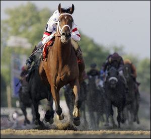 Big Brown, ridden by Kent Desormeaux, pulls away to capture the 133rd Preakness by 5 1/4 lengths.