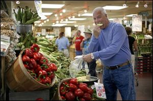 Dave Hackenberg enjoys the samples at The Andersons.