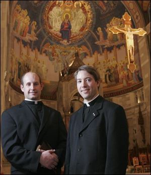 Deacons John Miller, left, and Eric Culler in Rosary Cathedral, where they will be ordained as priests today by Bishop Leonard Blair.