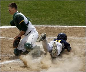 St. Ignatius  Frank DeSico scores against Start catcher Joe Maurer during the fifth inning of the Division I regional final.