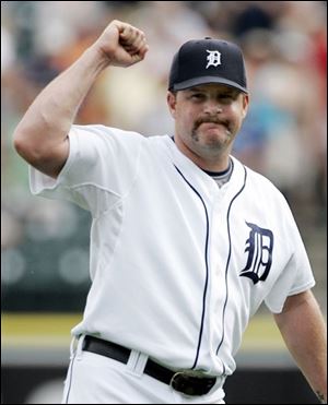 Detroit Tigers closer Todd Jones pumps his fist after getting Cleveland Indians' Asdrubal Cabrera to ground out in the ninth inning and record his 10th save in a baseball game Sunday.