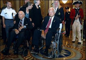 Sen. Robert Byrd, right, sits with fellow West Virginian Frank Woodruff Buckles, who fibbed about his age to join the Army in 1917.