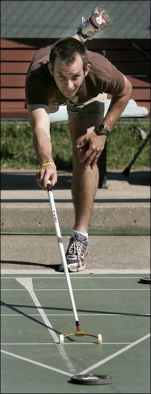 Bob Sudomir of Canton, 35, president of the Ohio State Shuffleboard Association, has won the national singles title four times, including last year, and the doubles title once.