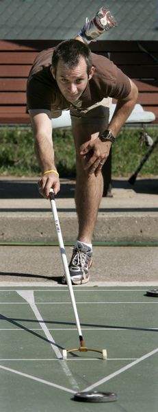 Shuffleboard-is-a-game-of-strategy-that-knows-no-age-limits-2