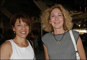 Elizabeth Kollar, left, and Sandra Hylant are just two Chicks for Charity at the fund-raiser for Assistance Dogs of America.
<br>
<img src=http://www.toledoblade.com/graphics/icons/photo.gif> <font color=red><b>VIEW</font color=red></b>: <a href=