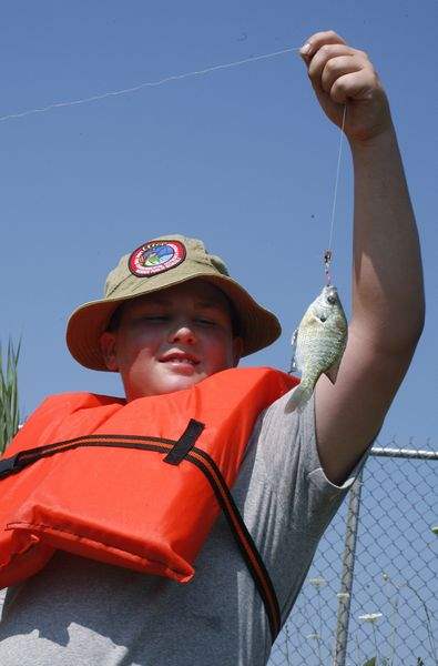 Youngsters-taught-the-ins-outs-of-angling-at-Bolles-Harbor-day-camp-3