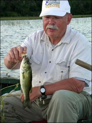 Bill Sonnett of Jackson, Mich., fooled this bass with an old Shakespeare plug on Stony Lake in the Irish Hills.