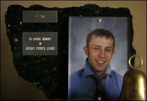 A plaque is dedicated to Jeffery Laskey, who hanged himself in a bathroom at Bowling Green High School.