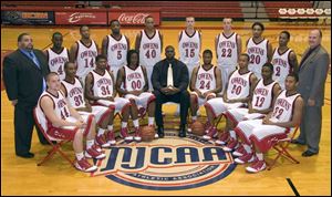 The Owens Community College men's basketball team is, from left, front, Brett McDougle, Ronnie Phillips, Terren Jones, Justin Manns, assistant coach Marcus Evans, DeAngelo Jordan, Brew Story, Tommie Clark, and Brandon Drake, and back, assistant coach Corey Tucker, Fletcher Noble, Michael Lee, Donald Lucious, Mario Graham, Chris Wade, Nick Owens, Joshua Robinson, Eric Thomas, and head coach Kevin Skaggs.