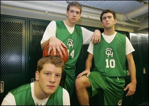 Ottawa Hills is the pick to win the TAAC with, from left, Kevin Nugent, Phillip Beans and Eliot Browarsky.