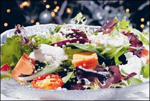 Field Greens with Roasted Cherry Tomatoes and Sweet Potato Croutons was  served at the Toledo Yacht Club.