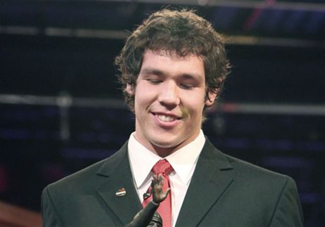 Oklahoma's Heisman winning quarterback Sam Bradford smiles while