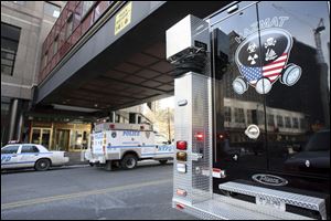 Hazardous material vehicles respond to a call to the World Financial Center, where the Wall Street Journal has offices.