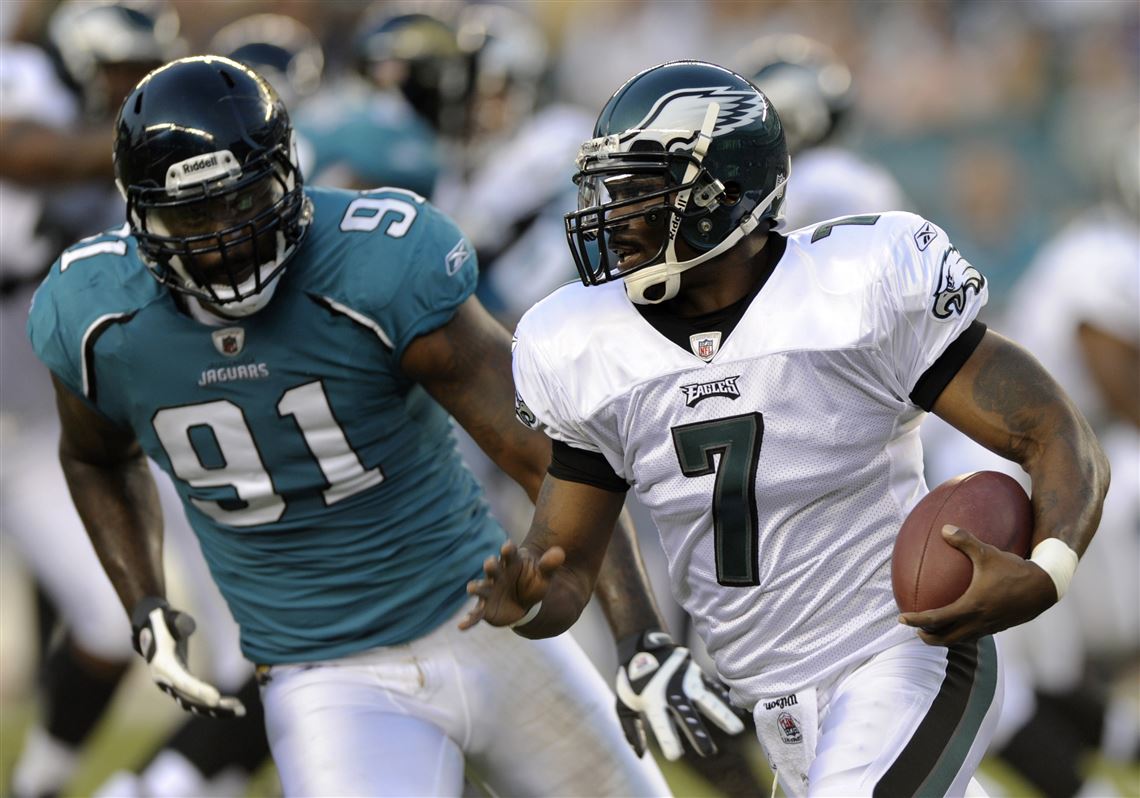 Atlanta Falcons quarterback Michael Vick walks off the field after