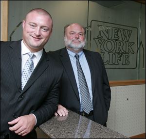  We are in the business of trying to grow,  says John Lehman, left, with Brian Nowak, at New York Life s offices in Maumee.