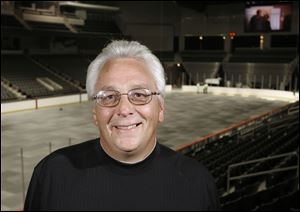 Dan Lewandowski is one of about 175 part-time seasonal workers who will staff the Lucas County Arena for sports and entertainment events. Free opening events are scheduled this weekend.