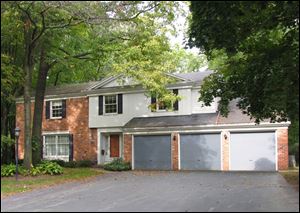 This family-sized home has room for everyone, with five bedrooms, a large backyard, a family room and more. To be sold to the highest bidder at auction October 18, you can preview it this weekend and next. 