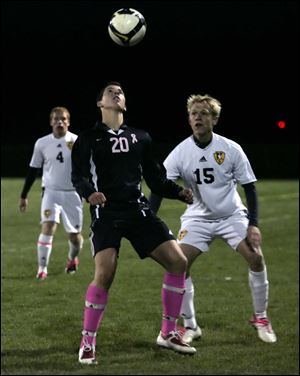 Perrysburg's Karter Sell (20) makes a play against Northview. The Yellow Jackets junior leads the team with 12 goals and nine assists. Perrysburg won the Northern Lakes League championship. 