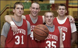 Size in Eastwood's core group of players, Clayton Ruch,left, 6-5, Clay Rolf, 6-8, Nick Schmeltz, 6-0, and Jon Juergens, 6-6, is expected to give the Eagles an advantage in Suburban Lakes League play. The Eagles are the reigning SLL champs after finishing last season 14-0 in league play.