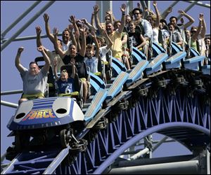 The Millenium Force roller coaster at Cedar Point is part of the package of rides and amusement parks to be acquired by Apollo Global Management LLC in a $2.4 billion package.