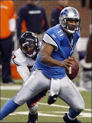 Detroit's Daunte Culpepper is sacked by Chicago's Mark Anderson during the third quarter Sunday.