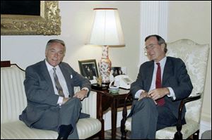 In this Sept. 25, 1985 file photo, U.S. Vice President George H.W. Bush meets with former Secretary of State Alexander Haig. Haig, who served Republican presidents and ran for the office himself, has died, Saturday, Feb. 20, 2010. He was 85.