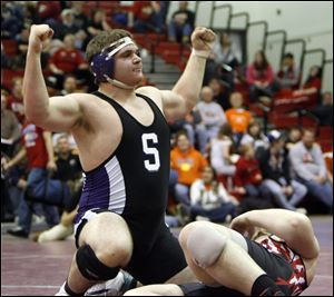 Swanton's Mimmo Lytle celebrates after pinning Crestview's Clint Endicott in the 285-pound Division III district final. Lytle is among three Swanton teammates to advance to the state tourney. Cardinal Stritch's Kyle Gladieux takes down Edison's Dylan Howard in the 160-pound district final. Gladieux is 40-1 this season. 