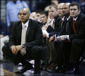 The University of Toledo said men's basketball coach Gene Cross decided his resignation would be the best move for the struggling team. 