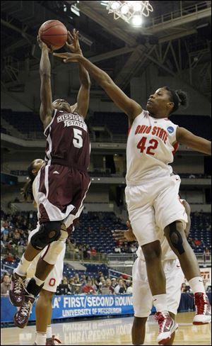 Mississippi State's Armelie Lumanu goes up for a score over Ohio State's Jantel Lavender.
