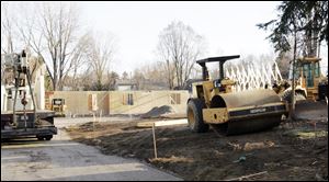 CTY build28p  Construction is going on behind a house at 6934 Brint. The Dotson Company [419.877.5776] is constructing housing for Mercy Outreach Industries IV, Inc. at 6934 Brint in Sylvania, Ohio on  Wednesday, March 24, 2010. They expect to be finished in late 2010. Jetta Fraser/Toledo Blade