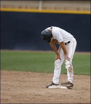 The Rockets' Jim Vahalik pauses at second base after
Bowling Green turned an eighth-inning double play.