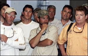 Charter and commercial fishermen listen to National Oceanic and Atmospheric Administration administrator Jane Lubchenco, not pictured, in Venice, La., Friday, April 30, 2010. Local fishermen are worried about how their industry will withstand a growing oil spill that resulted from last week's explosion and collapse of the Deepwater Horizon oil rig in the Gulf of Mexico near the coast of Louisiana.