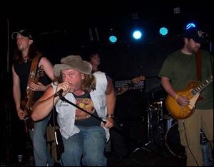 From left, Dirt Sayers, Michael Fisher, and Jason Copsey of Ugly Tribe Revival.