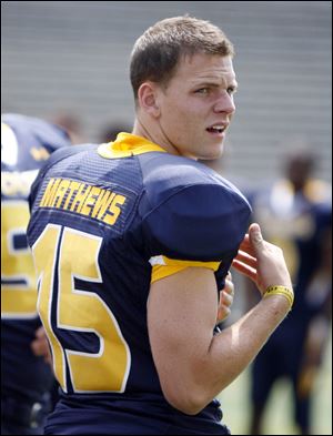 Mike Mathews, at picture day before being hurt, was hoping to get on the field this year on special teams.