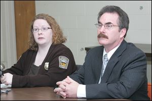 Dog Warden Julie Lyle, at a May news conference with John Dinon, head of the Toledo Humane Society and an advisory member of the dog committee, said she has no problems with the panel.