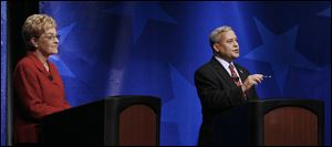 Marcy Kaptur and Rich Iott held their first televised debate Monday night at Bowsher High in Toledo, during which the rivals split on government's role.