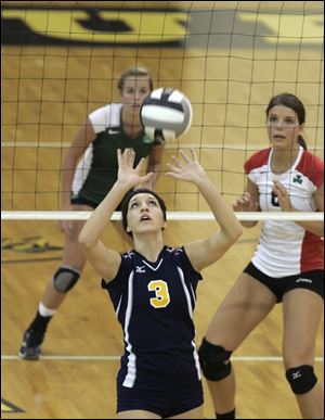 Notre Dame's Morgan Fioritto sets the ball during the Division I district semifinal against Central Catholic. 