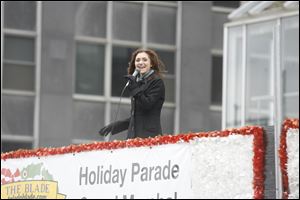 Disney actress Alyson Stoner greets spectators along the route from the grand marshal's float. She returned to her hometown, Toledo, to participate in the parade. 
<br>
<img src=http://www.toledoblade.com/graphics/icons/photo.gif> <font color=red><b>VIEW GALLERY:</b></font> <a href=