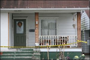 The missing boys were last seen in the backyard of this house on Congress Street in Morenci, the residence of their father, John Skelton. 