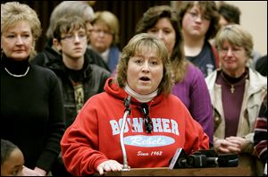 Christine Varwig, Toledo Parent Congress past president, speaks against Brian Wilson's remarks, saying they are demeaning. Her daughter is no ‘monkey,' she said, but a college-bound student on the honor roll. 