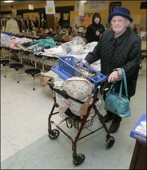 Toledoan Marie Miller shops at the annual garage sale at Northview.