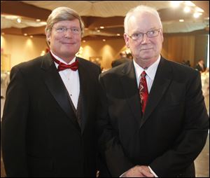 Board chairman David Lindstrom, left, and event chairman Buzz Hermann.