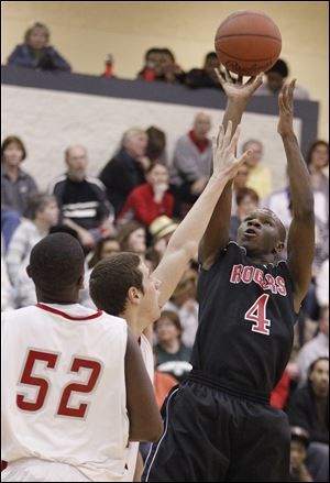 Glandoy Hill, a 6-foot-2 senior, takes a shot against Central Catholic. Hill averages 9.8 points per game for the Rams (16-5).