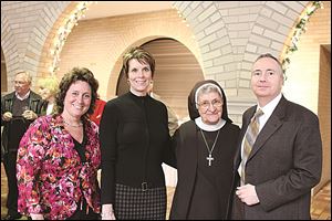 Left to right: Lourdes Department of Art Chair Erin Palmer Szavuly, Linda Brymer, Sr. Jane Mary Sorosiak, OSF, and Lourdes alumnus George Brymer.