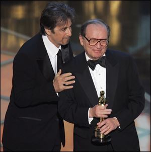 Director Sidney Lumet, right, received an honorary Oscar in 2005, presented by actor Al Pacino, who starred in two of Lumet's films.