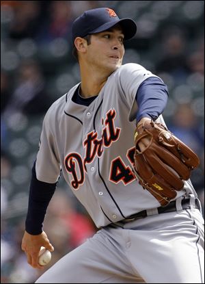 Detroit Tigers starting pitcher Rick Porcello readies a throw against the Seattle Mariners in the third inning Wednesday.