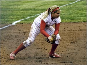 Owens Community College's Alaina Haubert makes a play at third base.