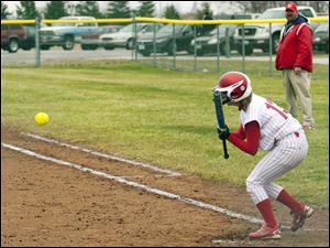 Kristen Roznoski, a Cardinal Stritch grad, at the plate for the Owens Community College softball team.